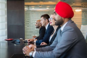Diverse Business Team at conference table