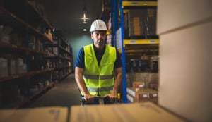 handsome-young-male-employee-concentrating-and-foc