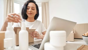 internet-store-employee-packing-merchandise-for