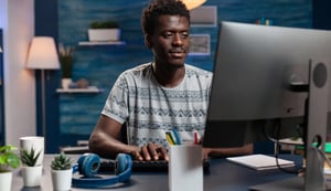 portrait-of-african-american-employee-using-computer