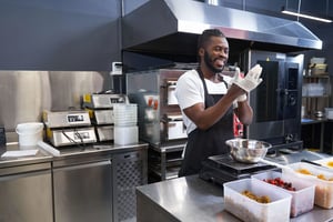 African Man working in a commercial kitchen